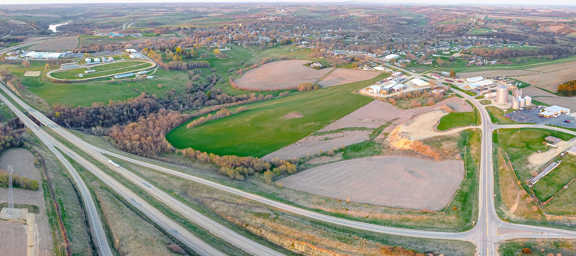 Aerial view of Mineral Point surrounded by farmland, wooded corridors, and regional roads